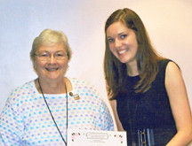 leah nightingdale right is shown receiving a scholarship from rose ...