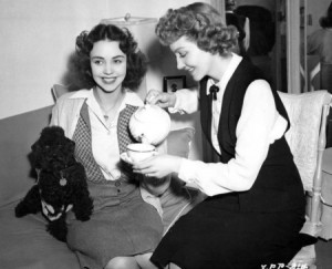Jennifer Jones and Claudette Colbert have a cup of tea between takes ...