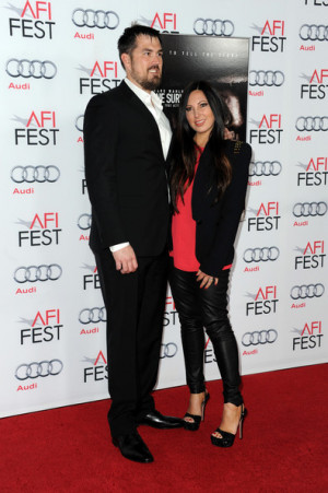 Marcus Luttrell (L) and Melanie Juneau attend the premiere for 