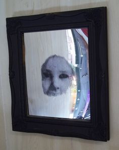 Creepy mirror for the Pub. Goodwill frame painted black sanded area on ...