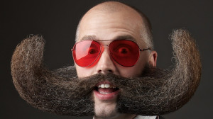 Mike Johnson (shown above), shows off his freestyle beard at the World ...