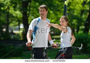 Happy Couple Ride Bicycle
