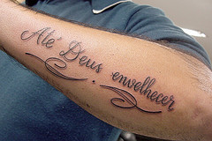 Relentless Forearm Tattoo Tags: tattoo arm script