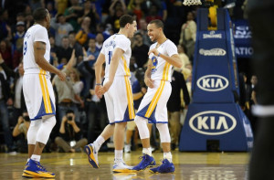... guard stephen curry 30 celebrates with shooting guard klay thompson