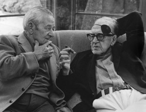 John Ford talking to William Wyler at a George Cukor hosted lunch for ...