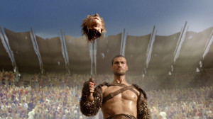 Spartacus (Andy Whitfield) beheads Solonius (Craig Walsh-Wrightson)