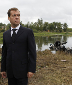 Russian President Dmitry Medvedev visits the crash site of a plane ...