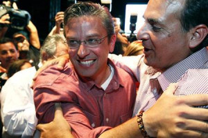 Padilla (L) celebrates his lead over Republican Governor Luis Fortuno ...