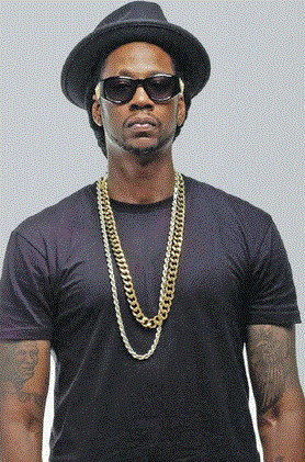 How tall is 2 Chainz? He stands at 6 foot 5 inches tall or 200 cm.