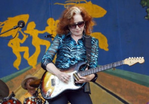 Bonnie Raitt performs at the New Orleans Jazz and Heritage Festival in ...