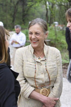 Alice Walton is talking and smiling