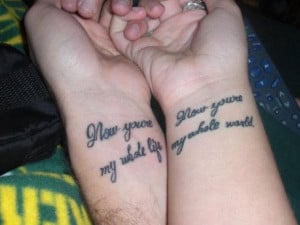 Cute tattoo couple quotes tattooed on the wrist.