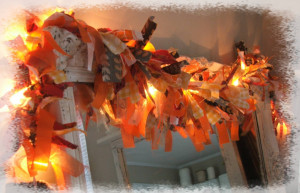 lit fall garland over a mirror, such reflection and sparkle.