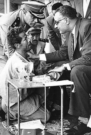 Gamal Abdel Nasser with Homeless Egyptian Man by Unknown Artist