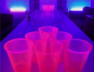 PINK solo cups. black light beer pong!!!