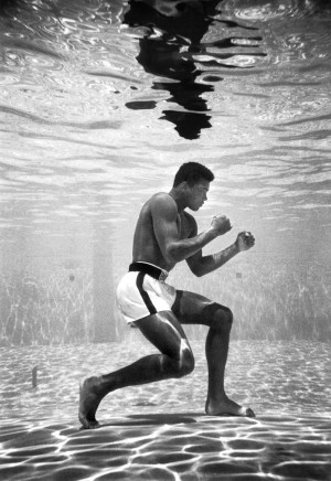 Muhammad Ali (then still Cassius Clay) training in a pool at the Sir ...