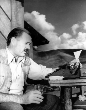 AP Nobel laureate Ernest Hemingway is shown at his typewriter while ...