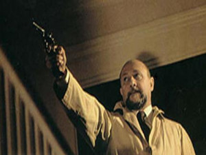 Description: Donald Pleasence as psychiatrist Dr. Samuel Loomis gives ...