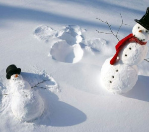 Snowman making snow angels