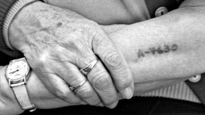 Emotional scars ... a Holocaust survivor's arm bears the tattoo of the ...