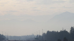 Haze from smoke covers a highway in Anchorage, Alaska, Thursday, May ...