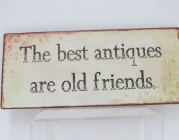The best antiques are old friends' sign Decorative sign displaying an ...