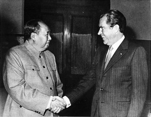 The Communist revolutionary , shaking hands with a life-long commie ...