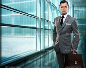 Businessman inside modern building - Stock Image