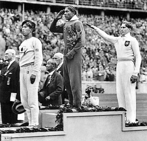 Triumph: Jesse Owens (centre) beat German Luz Long (right) to win the ...