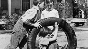 Jem and Dill were pushing me in a tire until Jem shoved me into the ...