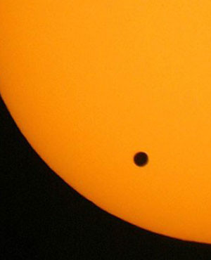 photo shows the transit of Venus, which occurs when the planet Venus ...