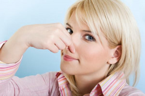 woman-holding-nose-stink
