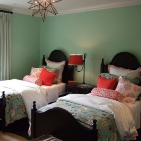fun kid’s bedroom for two is drenched in a calming shade of mint