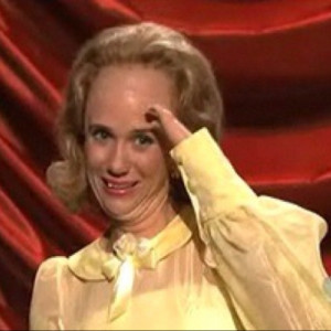 Kristin Wiig sporting big forehead, little hands in a Lennon Sisters ...