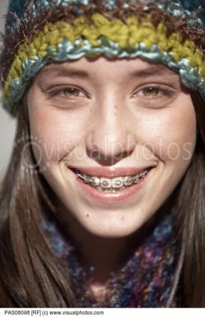 Smiling teenage girl with braces