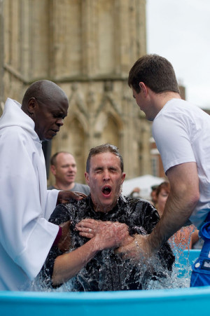 John Sentamu Archbishop of York Dr John Sentamu baptises a local