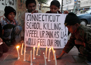 ... +of+karachi+pakistan+pay+tribute+to+the+victims+of+sandy+hook.jpg