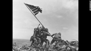 1945 photograph of U.S. troops raising a flag in Iwo Jima during ...