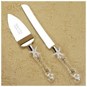 This beachy cake cutting set features shimmering starfish, embellished ...