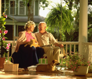 Older Couple Relaxing on Porch Swing HD Wallpaper