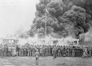 British soldiers burn down the barracks of the Belsen camp in order to ...