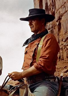 John Wayne in The Searchers (dir. John Ford)