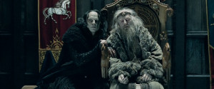 Gríma and King Théoden as Gandalf enters Meduseld