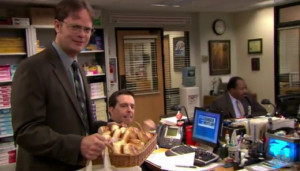 Bagels in hand, Dwight seeks to get his co-workers to 