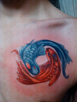 This classic Pisces tattoo done in red and blue is fantastic! The ...