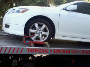 24 Hour Towing , Flatbed Hauling, Winching and Roadside Assistance