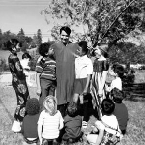 Peoples Temple included this photo of the Rev. Jim Jones surrounded by ...