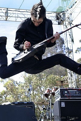 Justin Sane, 19, guitar and lead vocals