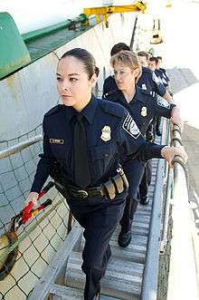 Customs and Border Protection officers board a ship.