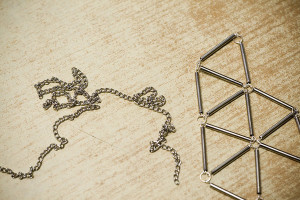 Silver bugle geometric necklace